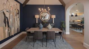 Contemporary mural in the dining room of a modern Dallas home with navy blue and neutral accents. 